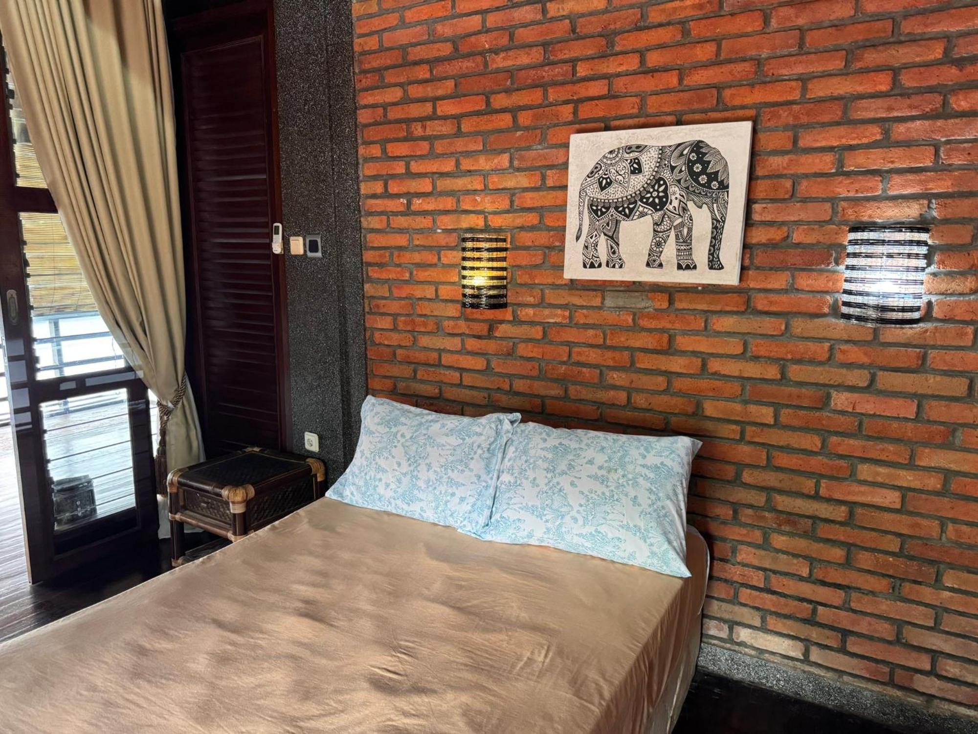 Giri Hill Homestay Нуса-Дуа Екстер'єр фото